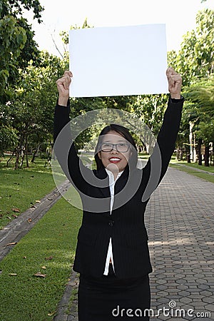Business women holding signs Stock Photo