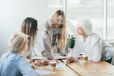 Business women teamwork analysis brainstorming Stock Photo