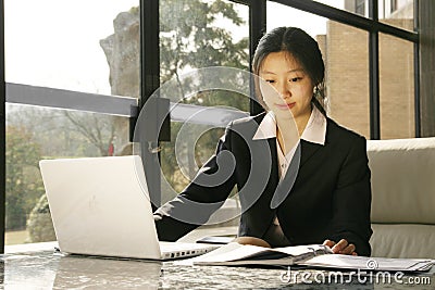 Business women working with laptop Stock Photo