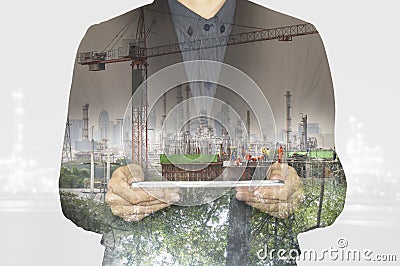 Business working on tablet.Green nature environment tecnology factory industry to concept. Stock Photo