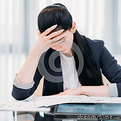 Business workload inefficient work tired woman Stock Photo