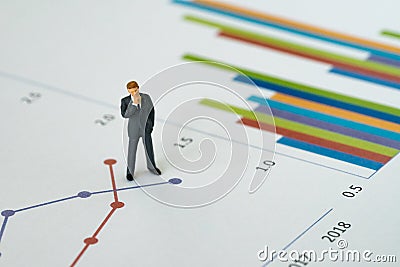 Business yearly performance review concept, miniature people fig Stock Photo