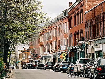 Businesses and brick buildings on Main Street in downtown Rockland, Maine Editorial Stock Photo