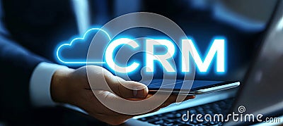 Businessman Accessing Cloud Based CRM System via Mobile Device, CRM Text in Glowing Cloud Stock Photo