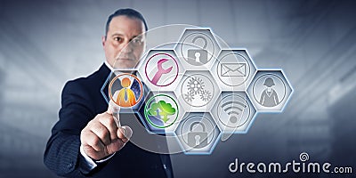 Businessman Activating Managed Services Icons Stock Photo