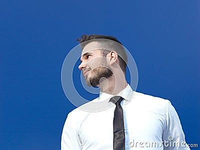 Businessman against blue background Stock Photo