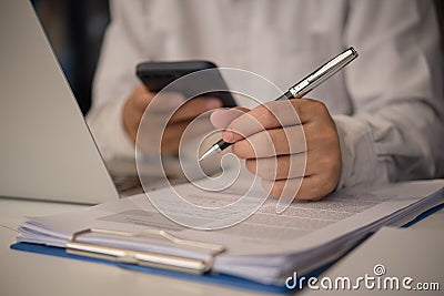 businessman agree to make deal signing document, sale contract or legal transaction contract at desk Stock Photo