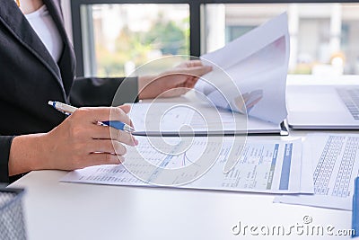 Businessman analysis comparing financial reports Stock Photo