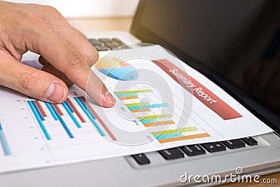 Businessman analyzing investment charts with laptop. Finance Mar Stock Photo