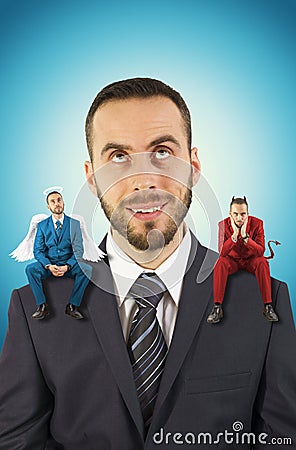 Businessman with angel and devil on his shoulders. Stock Photo