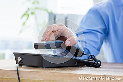 Businessman answer the phone Stock Photo