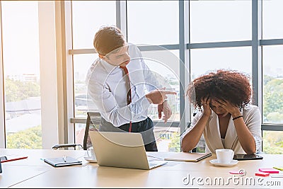 Businessman as boss blaming and admonish his employee Stock Photo