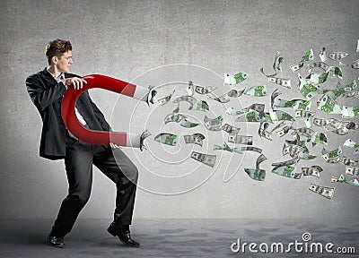 Businessman attracts money Stock Photo