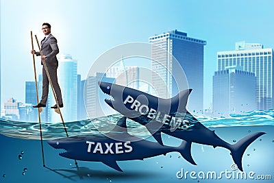 The businessman avoiding paying high taxes Stock Photo