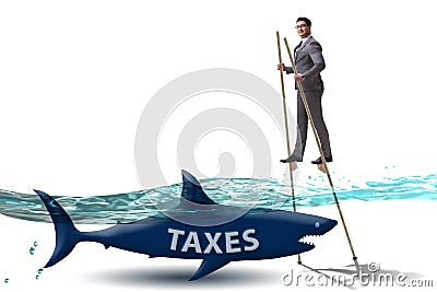 The businessman avoiding paying high taxes Stock Photo