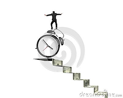 Businessman balancing alarm clock on money stairs Stock Photo