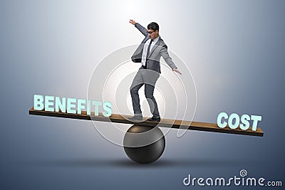 Businessman balancing between cost and benefit in business conce Stock Photo