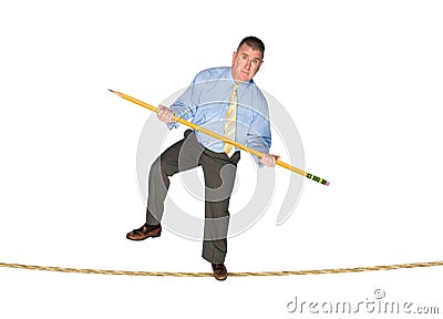 Businessman balancing on tightrope Stock Photo