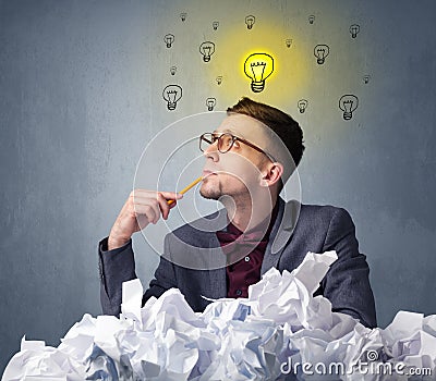 Businessman behind crumpled paper Stock Photo