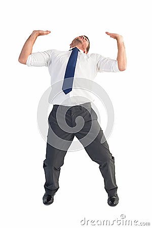 Businessman bending and pushing Stock Photo