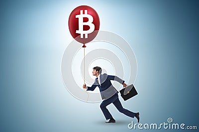 Businessman in bitcoin bubble concept Stock Photo