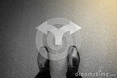 Black shoes at the crossroad - darkness of brightness Stock Photo