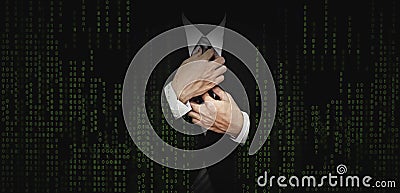 Businessman in black suit with abstract green computer code graphic background. business banking, internet safety security concept Stock Photo