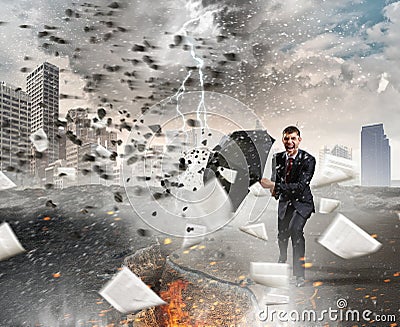 Businessman with black umbrella. Mixed media Stock Photo