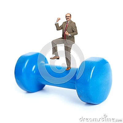 Businessman and blue dumbbells Stock Photo