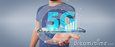 Businessman using 5G network with mobile phone 3D rendering Stock Photo