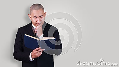 Businessman and Book Source of Knowledge Stock Photo
