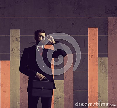 Businessman with briefcase standing over column diagram background. Business, office, career, job concept. Stock Photo