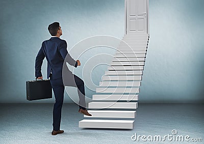 Businessman with briefcase walking up stairs to door Stock Photo