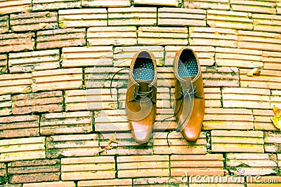 Businessman Brown Shoes Top View on brick background Stock Photo