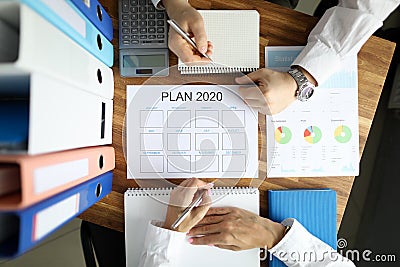 Businessman and businesswoman make work plan 2020 Stock Photo