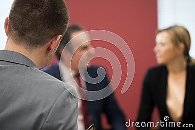 Businessman And Businesswoman In Mediation Meeting Stock Photo