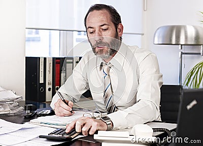 Businessman calculating finance Stock Photo