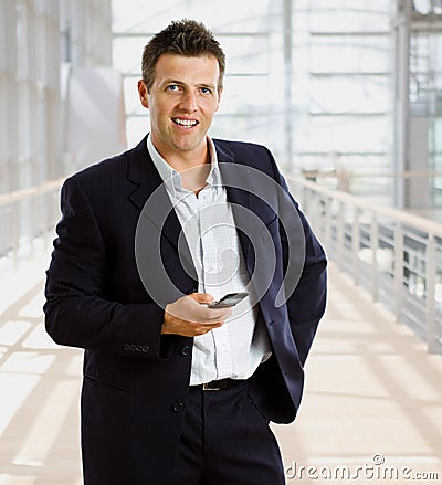 Businessman calling on mobile phone Stock Photo