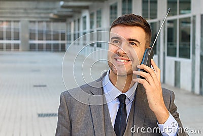 Businessman calling with old style wireless landline telephone Stock Photo