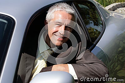 Businessman in car Stock Photo