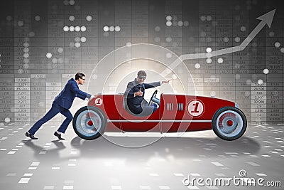 The businessman car pushing in teamwork concept Stock Photo