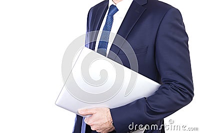 Businessman carries laptop under arm isolated on white background Stock Photo