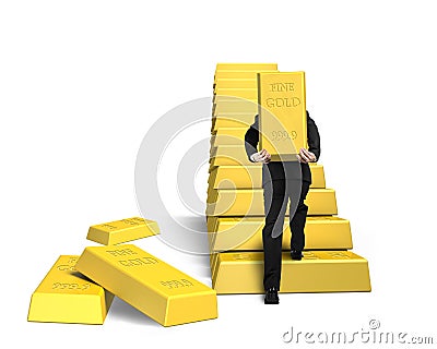 Businessman carrying bullion on golden stairs Stock Photo