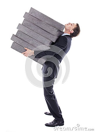 Businessman carrying high burden Stock Photo