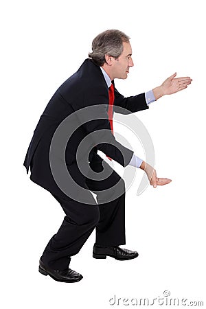 Businessman carrying something Stock Photo