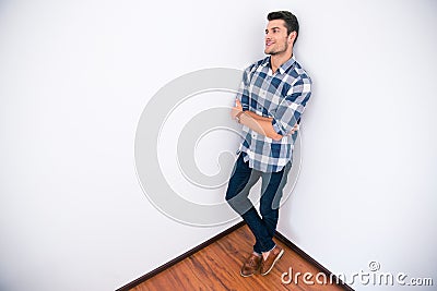 Businessman in casual cloth standing corner of the room Stock Photo