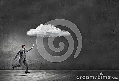 Businessman catch cloud Stock Photo