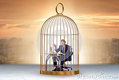 Businessman caught in the cage Stock Photo