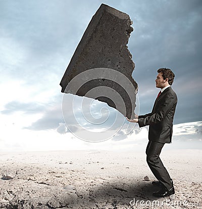 Businessman challenging the difficulties Stock Photo