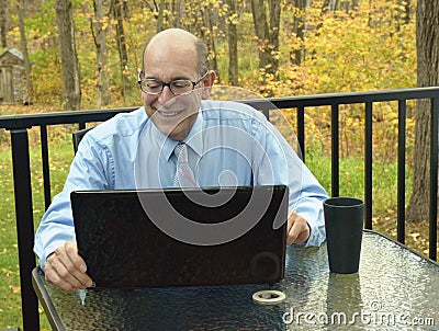 Businessman checks his Stock Portfolio Online Stock Photo